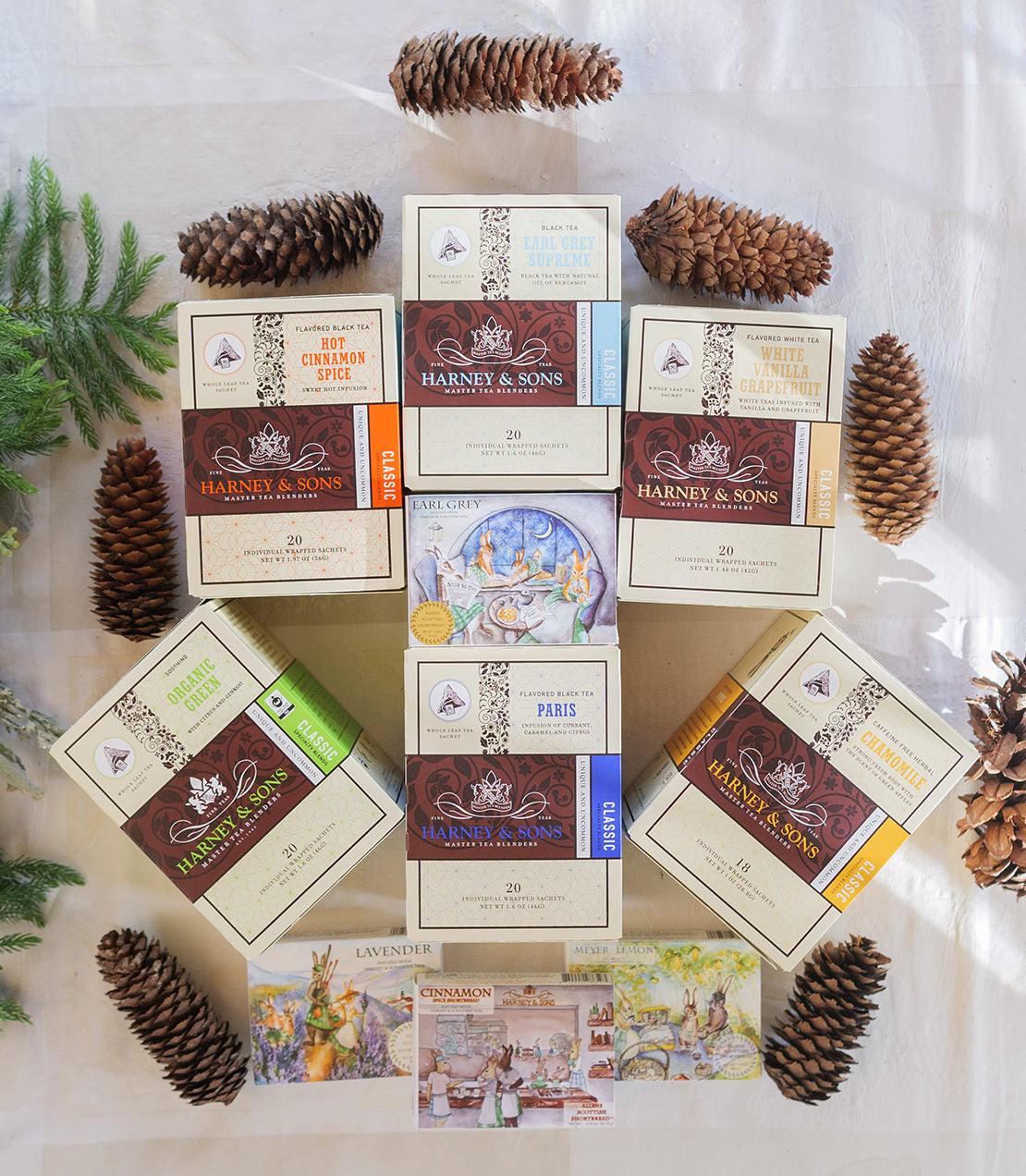 Tea-and-biscuits-gift-lifestyle-6-boxes-wrapped-sachet-4-boxes-shortbread-pinecones